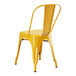 A Lancaster Table & Seating citrine yellow metal outdoor cafe chair with a seat and back.