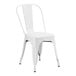 A white metal Lancaster Table & Seating outdoor cafe chair with a backrest.