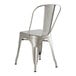 A Lancaster Table & Seating silver metal chair with a backrest.