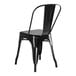 A Lancaster Table & Seating black metal outdoor cafe chair with a back and seat.