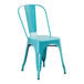 A Lancaster Table & Seating turquoise metal outdoor cafe chair.