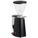 A black and silver Estella Caffe espresso grinder.