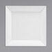 A white square plate with a white border.
