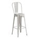 A silver Lancaster Table & Seating indoor cafe barstool with a backrest.