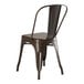 A brown metal Lancaster Table & Seating outdoor cafe chair with a backrest.