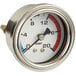 A close-up of a white Estella Caffe water pressure gauge with red, blue, and green dials.