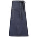 A Mercer Culinary indigo blue denim bistro apron with a belt and pockets.