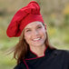 a woman wearing a chef hat