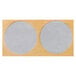 Two circular wooden discs with black circles on them.
