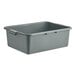 A Carlisle gray plastic bus tub with handles.