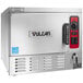 A silver Vulcan countertop steamer with red and black dials.