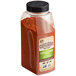 A jar of Cattlemen's Chili Lime BBQ Rub with red powder inside.