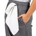 Uncommon Cargo chef pants with a towel in the pocket.