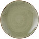 A Tuxton TuxTrendz china plate with a green speckled pattern.