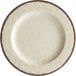 A white Carlisle round melamine plate with a brown rim.