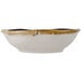 A white China bowl with brown edges.