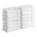 A stack of white Lavex bath towels.