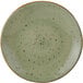 A Tuxton TuxTrendz olive china plate with a speckled geode pattern in brown and green.