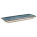 A rectangular white china tray with blue and gold geode accents.