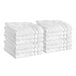 A stack of white Lavex bath mats.