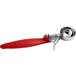 A red and silver Hamilton Beach ice cream scoop with a metal thumb press.