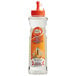 a bottle of liquid with orange and white design
