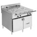 A Vulcan stainless steel chef station on a counter.