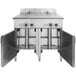 A large stainless steel Vulcan Versatile Chef Station with two doors.