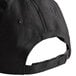 A black baseball cap with a white logo on it.
