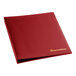 A red faux leather reservation book with gold text on a table.