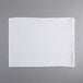a white cloth on a gray surface