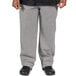 a person wearing pants with a checkered pattern