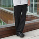 a person wearing black pants