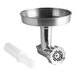 A stainless steel meat grinder attachment with a white plastic tube.