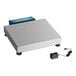 A digital receiving scale with a stainless steel platform and an attached power adapter.