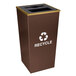 An Ex-Cell Kaiser brown hammered copper recycle bin with a recycle symbol on it.