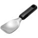 An OXO black and silver ice cream spade with a handle.