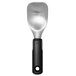 An OXO black and silver aluminum ice cream spade with a handle.