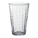 A clear Duralex highball glass with a checkered pattern.