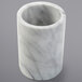 An American Metalcraft white marble cylinder with a grey surface.