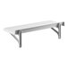 A white Cambro Camshelving wall shelf with metal brackets.