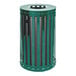 A green and black metal Ex-Cell Kaiser Streetscape outdoor trash receptacle.