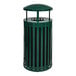 a green trash can with a lid