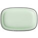 A green rectangular porcelain platter with black trim.