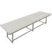 A Safco Mirella white rectangular standing conference table with metal legs.