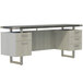 A Safco Mirella stone gray and white free-standing credenza with drawers.