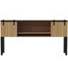 a wooden shelf with a black frame
