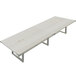 A white Safco Mirella rectangular conference table with metal legs.