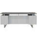 A Safco Mirella free-standing desk with a stone gray top and white ash legs and drawers.