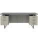 A Safco Mirella free-standing desk with white ash drawers and a stone gray top.